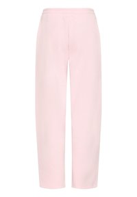 Svetlo roza trenirka iz mehkega blaga, z elastičnim pasom in sproščenim krojem s ravnimi nogami. Dodatne podrobnosti niso vidne.