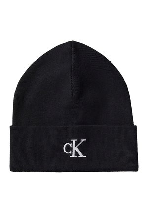 Bonnet tricoté noir avec revers plié et logo blanc "cK" brodé au centre avant du revers.