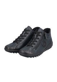 Schwarze Lederschuhe mit kontrastierenden strukturierten Akzenten, Schnürung an der Vorderseite, seitlichem Reißverschluss und Gummisohlen mit strukturiertem Grip-Muster.