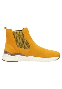 Bottine jaune en daim avec panneau latéral élastique à motif, semelle blanche et accent métallique au talon, vue du côté extérieur.