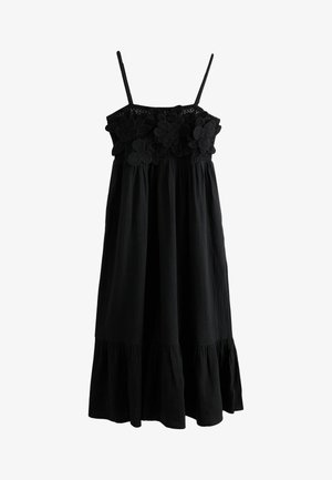 Schwarzes ärmelloses Midikleid mit dünnen Trägern, floralem Spitzen-Detail auf der Brust und gerafftem Stoff am Saum.