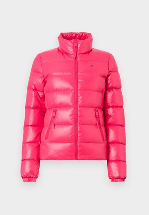 Pink quilted puffer jacket with high collar, front zipper, and two zippered side pockets, displayed against a plain light background.