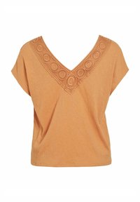 Pomarańczowa bluzka z krótkim rękawem, wykonana z fakturowanej tkaniny i z dekoltem w kształcie litery V. Dekolt ozdobiony jest okrągłymi haftami.