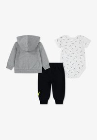 Nike Sportswear TOSS SET - Tracksuit bottoms - black