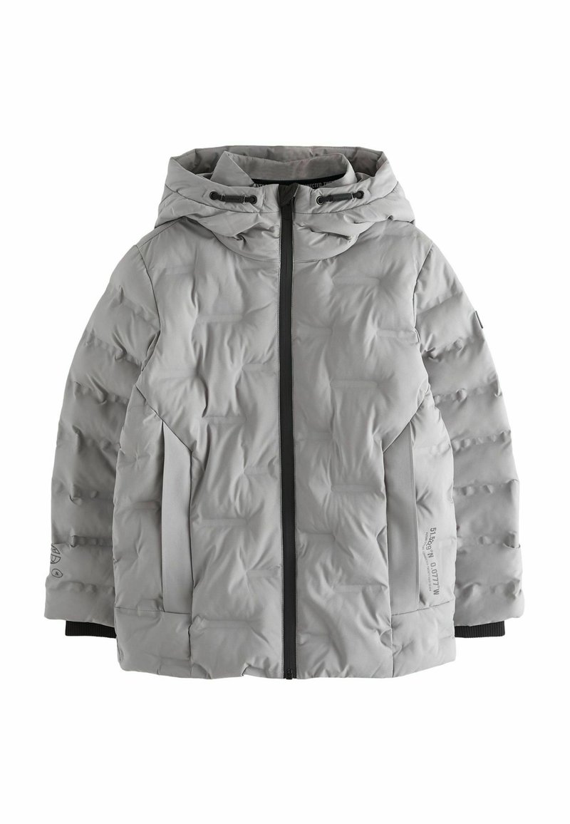 Grå vadderad puffjacka med huva, framzipper och svarta detaljer på ärmslut och sidor. Slät textur och isolerat utförande.