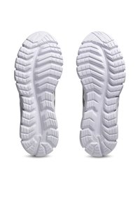 Sko sålar har en texturerad vit gummimaterial med ett djup mönster för grepp, och visar en böjd, konturerad form.