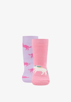 Pair of children's socks, one pink with a white unicorn and the other lavender with multiple pink unicorns.