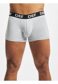 Gray boxer briefs with a black elastic waistband featuring the letters "DEF" in white. Fitted design with a smooth texture.