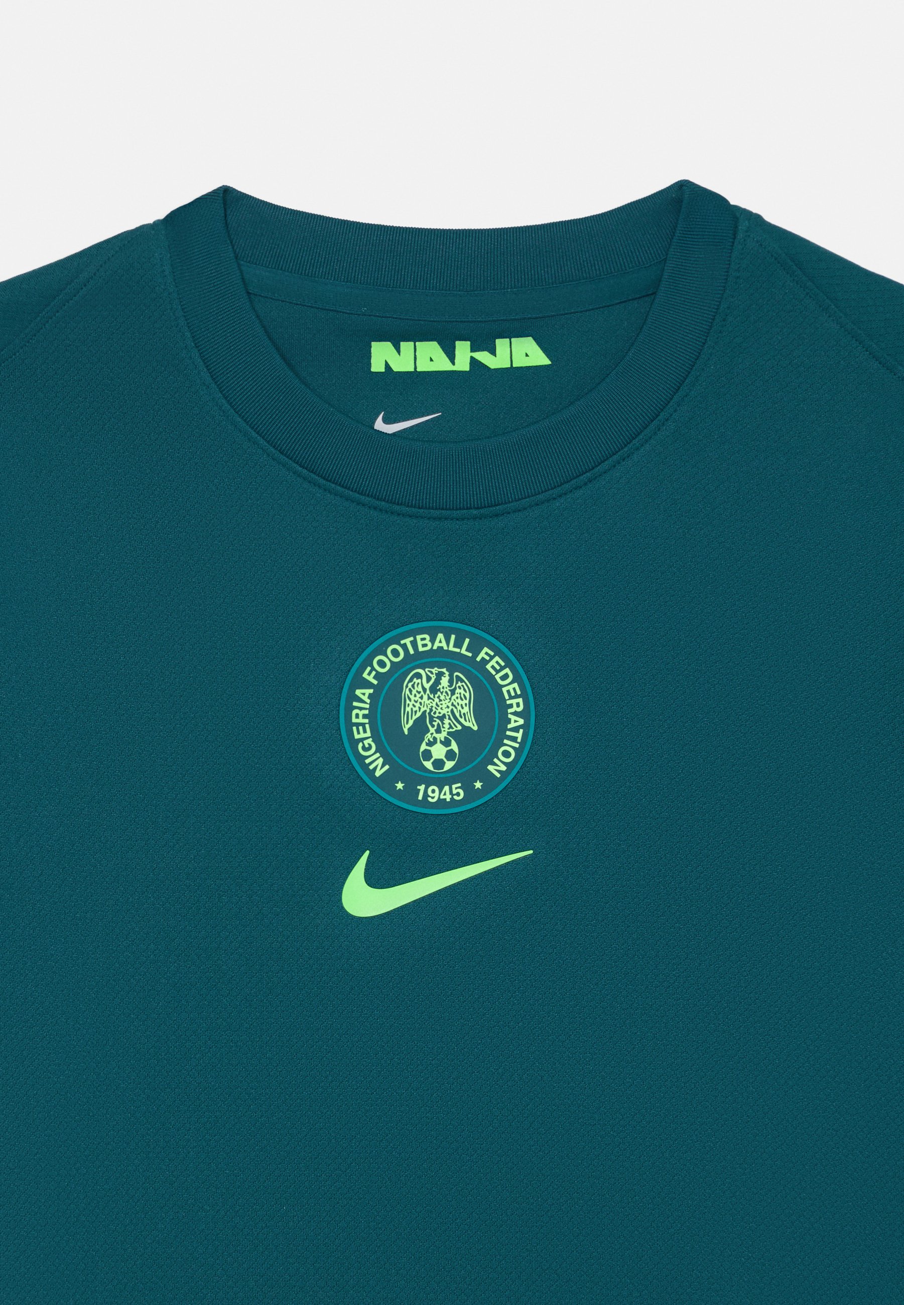 blue and green nike shirt