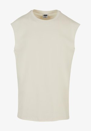 Beige sleeveless cotton top with a crew neck and rounded hem. Smooth texture, minimalistic design, no patterns or embellishments.
