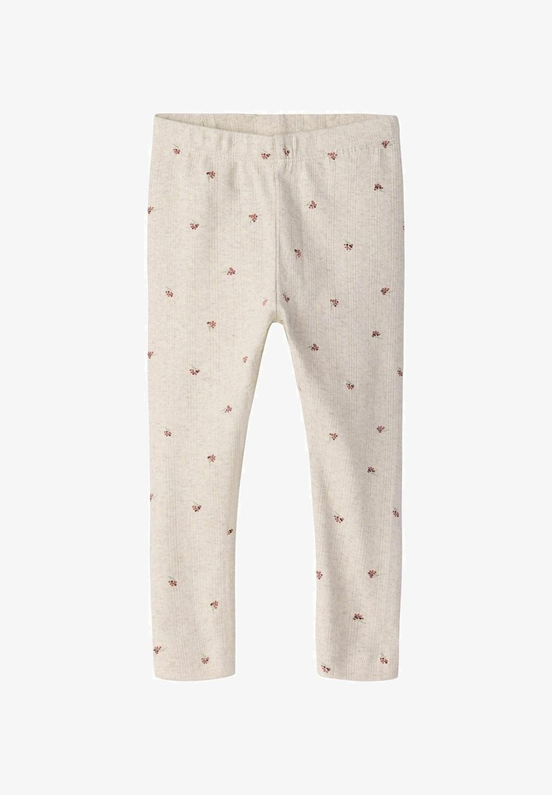 Beżowe prążkowane legginsy z drobnym, różowym, kwiatowym nadrukiem, elastyczną talią i dopasowanym krojem na całej długości.