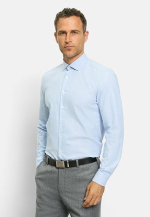 Light blue long-sleeve button-up shirt with subtle texture, a classic collar, and a fitted design, paired with grey trousers and a black belt.