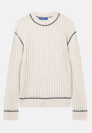 Off-white ribbed sweater made from soft fabric, featuring dark gray accents at the neckline and hem, with long sleeves.