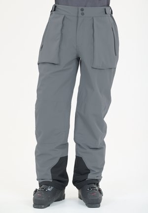 Grijze sneeuwbroek met cargopockets, verstelbare tailleband en zwart ondergedeelte. Gemaakt van duurzaam, waterafstotend materiaal.