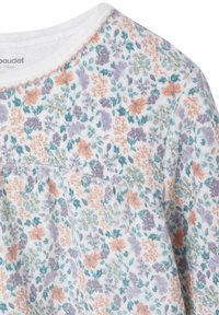 Floral top in white cotton featuring a pastel color palette of orange, purple, and green flowers, with gold metallic accents. Includes a pocket.