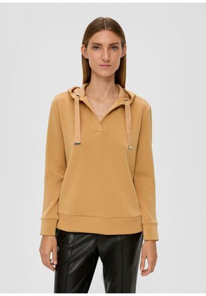 Haut à capuche jaune moutarde avec un col en V, des poignets côtelés et des cordons de serrage ajustables. Le tissu semble doux, avec une coupe décontractée et une poche kangourou.