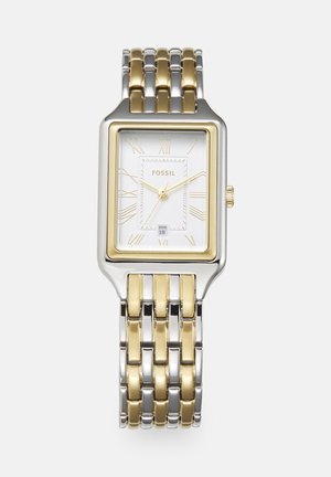 Montre-bracelet rectangulaire Fossil avec cadran blanc, chiffres romains dorés, affichage de la date et bracelet en métal bicolore argent et or.