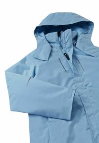 Light blue waterproof jacket with hood, front zipper, adjustable sleeve cuffs, and reflective strips on chest and sleeves.
