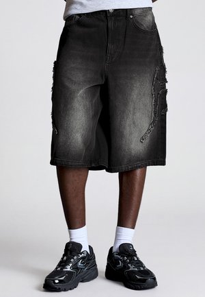 Bershka PATCH BAGGY - Denimové šortky - black