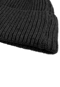 Black knitted beanie hat with vertical ribbed texture, soft wool material, and a rolled cuff at the bottom.