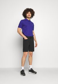Calvin Klein Golf PLANET  - Polo - indigo