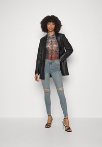 Dr.Denim LEXY - Calças de ganga de corte skinny - blue denim