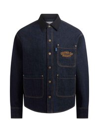 Mørk denimjakke med knappet front, to store lommer og en brystlomme. Har kontrastfarget oransje broderi og gyldne knapper.