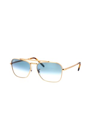 Occhiali da sole in metallo dorato con montatura quadrata, lenti blu sfumate e design a doppio ponte. Presentano bracci testurizzati e accenti del logo.