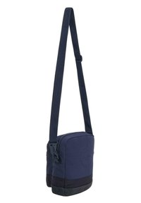 Borse a tracolla blu navy con chiusura a zip, pannello inferiore testurizzato e logo in rilievo nella parte anteriore. Design minimalista con tracolla regolabile.