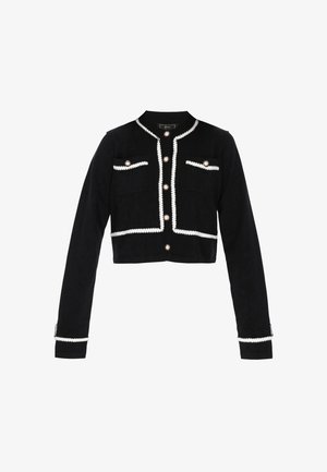 Fekete, lágy anyagú, cropped dzseki fehér díszítéssel, négy gombbal és két dekoratív zsebbel, gyöngyszerű akcentussal.