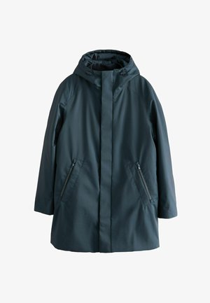 Veste imperméable vert foncé avec capuche, dotée de poches latérales zippées et d'une coupe droite. Texture lisse et design minimaliste.