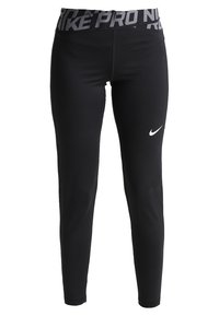 Leggings de sport noires avec un design ajusté, fabriqués en tissu extensible, comportant une taille grise "NIKE PRO" et un petit logo Nike blanc.