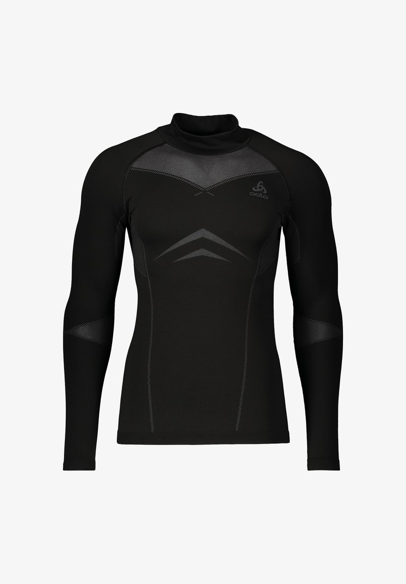 Camiseta deportiva negra de compresión con mangas largas, cuello alto, paneles texturizados y diseños sutiles de chevrones y logotipo en el pecho.