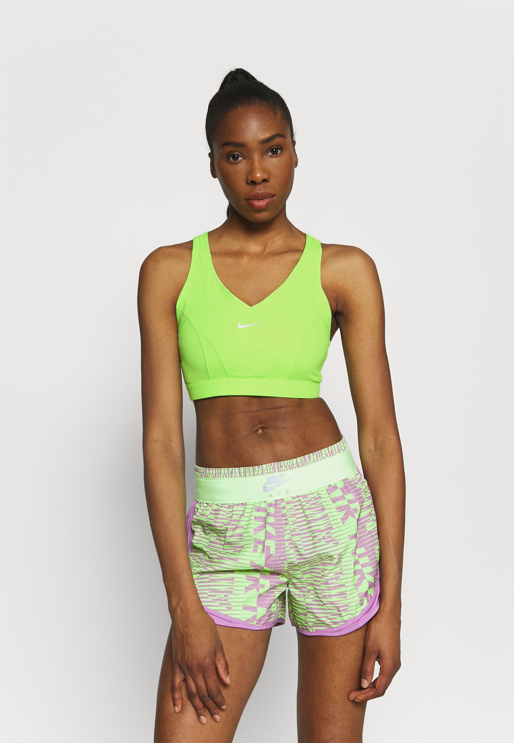 Nike Performance BRA - Sport-bh met medium support - lime glow/barely  green/neongroen - Zalando.nl