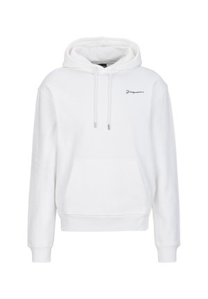 Sweat à capuche blanc avec poche avant, cordons, poignets côtelés et petit logo noir en cursive sur la poitrine gauche.