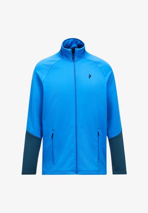 Blaue Zip-Jacke aus glattem Stoff mit hohem Kragen, kontrastierenden dunkelblauen Akzenten an den Ärmeln und seitlichen Taschen mit Reißverschlüssen.