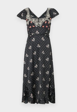 Μαύρο μεσαίο φόρεμα με λουλουδάτα και πουά σχέδια. Διαθέτει ντεκολτέ σε σχήμα V, κοντά μανίκια με βολάν και τελείωμα με βολάν. Κατασκευασμένο από ελαφρύ ύφασμα.