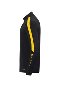 Maglietta nera a maniche lunghe con una striscia gialla laterale, tessuto texturizzato e cinque bottoni gialli sul polsino. Design con colletto alto.