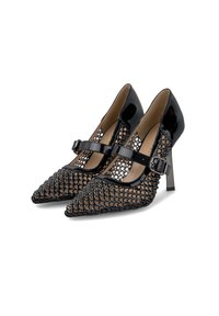 Scarpe nere con tacco alto e punte appuntite, dettagli in pelle lucida e design in rete sulla tomaia. Cinturino con fibbia regolabile sulla parte superiore del piede.