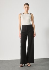 Anna Field Auduma bikses - black