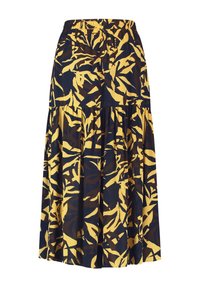 Jupe maxi avec une taille élastique, présentant un fond marine et un imprime audacieux de feuilles jaunes, fabriquée à partir d'un tissu léger.
