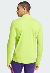 adidas Performance PREDATOR TRAINING - Langarmshirt - semi solar slime lucid fuchsia