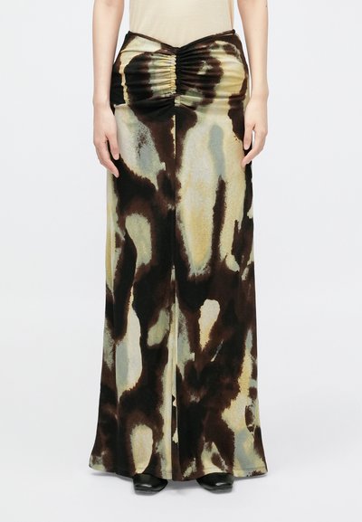 Long skirt in soft velvet fabric with an abstract brown, green, and beige pattern. Gathered waist detail creates texture. Seamless hem.