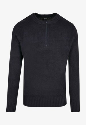 Pull en tricot bleu marine foncé avec un col rond côtelé, des manches longues et une courte fermeture éclair au niveau du col. Texture lisse avec une coupe ajustée.