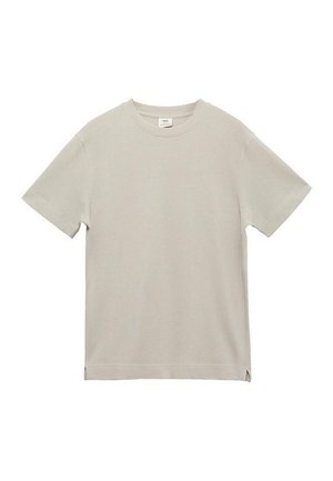 Lichtbeige T-shirt met korte mouwen van ribstof. Klassiek crewneck ontwerp met zijsplitten aan de zoom. Gladde textuur, minimalistische stijl.