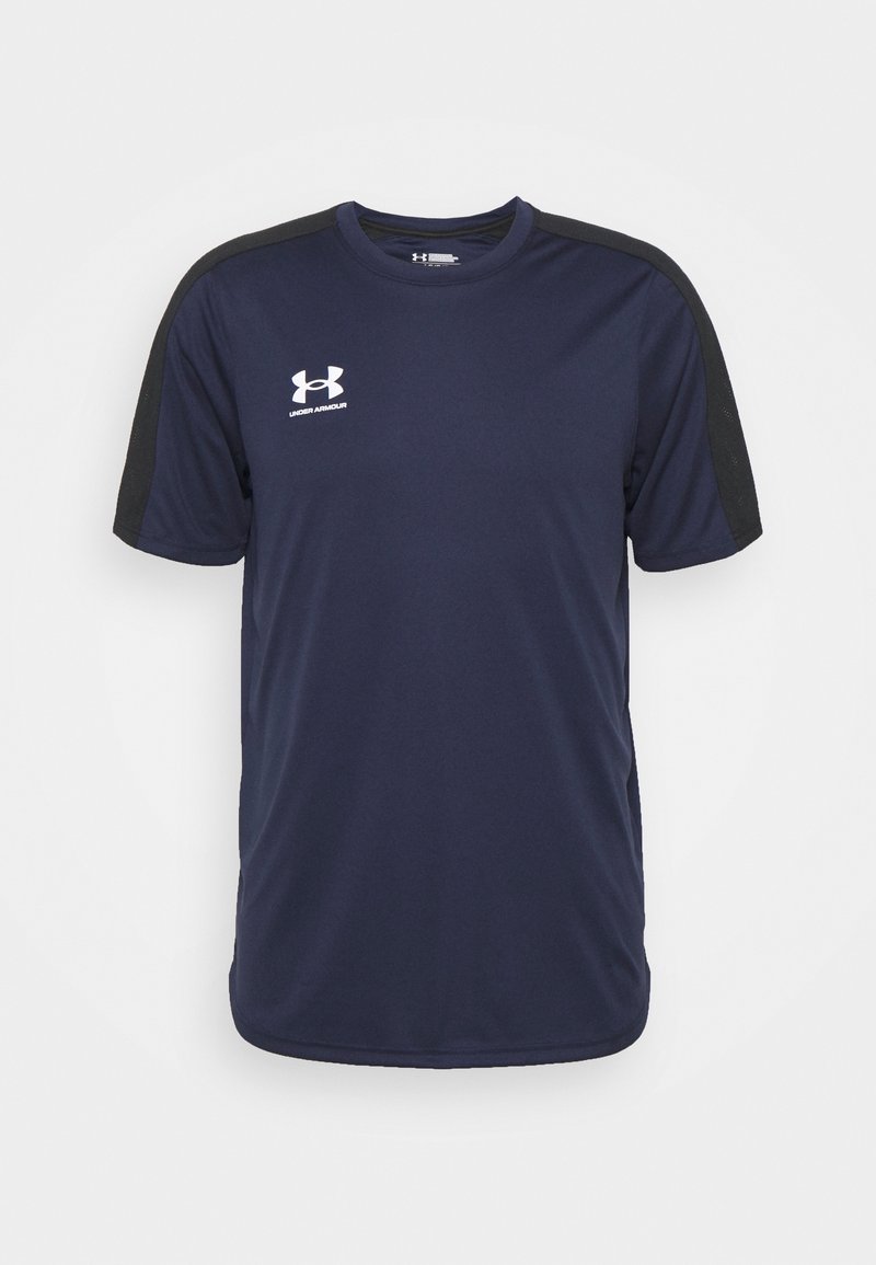 Marineblaue Sportshirt mit schwarzen Schulterakzenten. Hergestellt aus glattem, feuchtigkeitstransportierendem Material. Verfügt über das weiße Under Armour Logo auf der Brust.