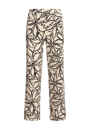 Wijdvallende broek van beige stof met een zwart bloemmotief. Het ontwerp bevat ingewikkelde bladeren en omlijningen.