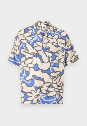 Lühikeste varrukatega nööbiga särg in kerge beež värvusega, siniste lille- ja abstraktsete mustritega, millel on rinna-tasku ning heledast pruunist nuppudest.