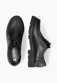 Chaussures en cuir noir avec une texture lisse, bout arrondi et coutures décoratives. Semelle en caoutchouc épaisse avec une semelle rugueuse pour une bonne adhérence.
