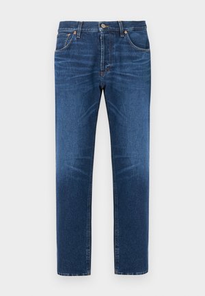 Mørkeblå jeans med rette ben laget av denim, med fem lommer, knapp- og glidelåslukking, og subtil falming på lårene.